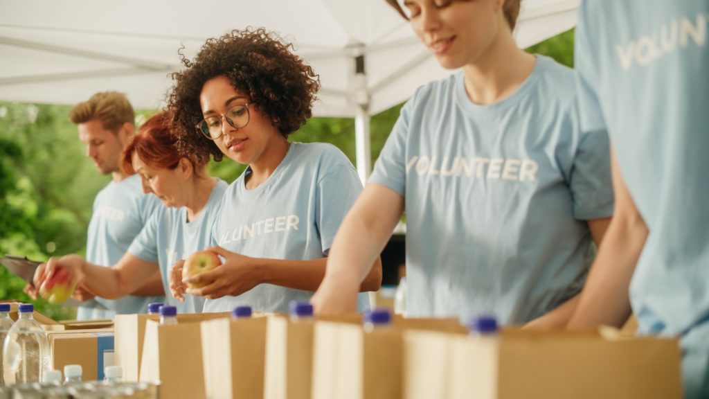 Volunteers working on building food boxes.