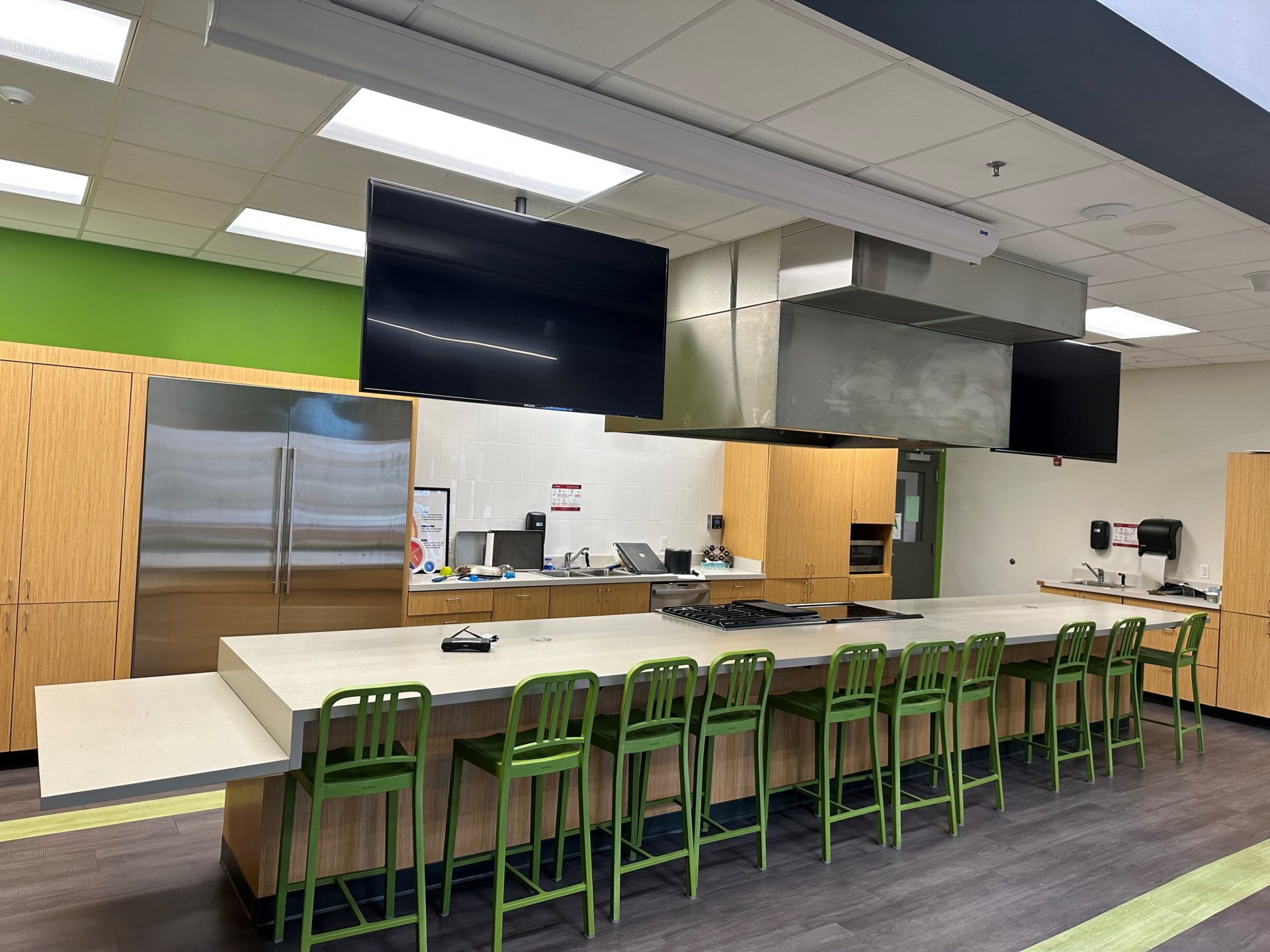 A classroom in front of a commercial kitchen.